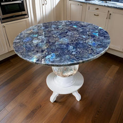 Elegant Round Labradorite Gemstone Table with White Pedestal Base in Modern Kitchen